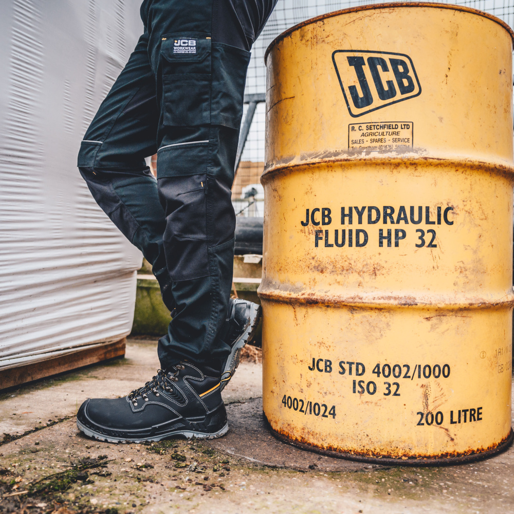 detail JCB Trade Hybrid Stretch černé pánské pracovní kalhoty